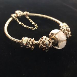14kt Pandora bracelet with 14k charms.19cm